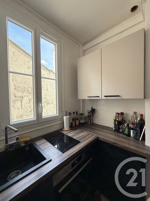Appartement F3 à louer - 3 pièces - 51.65 m2 - PARIS - 75018 - ILE-DE-FRANCE - Century 21 Sorim
